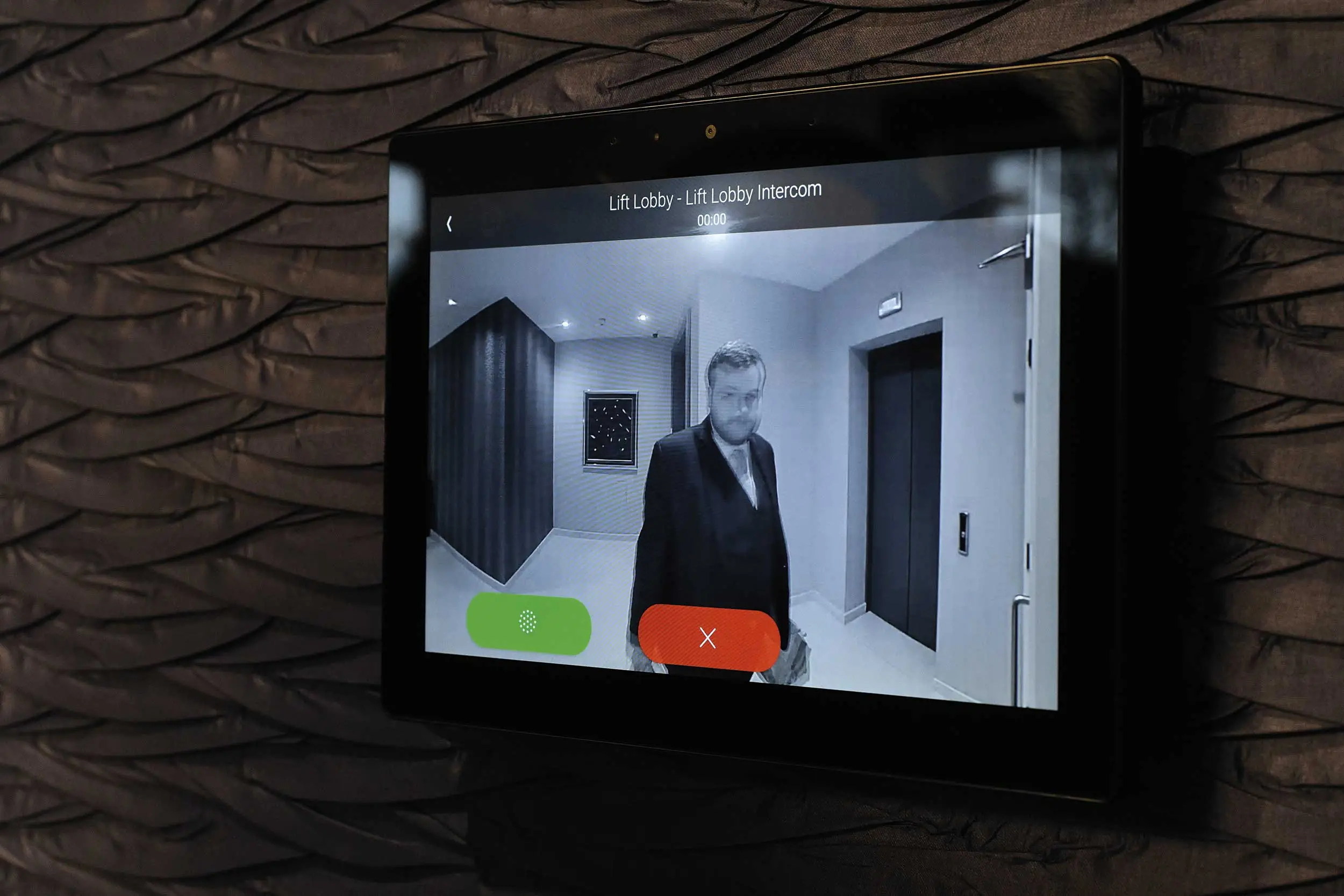 Control4 touch screen provides video intercom capability