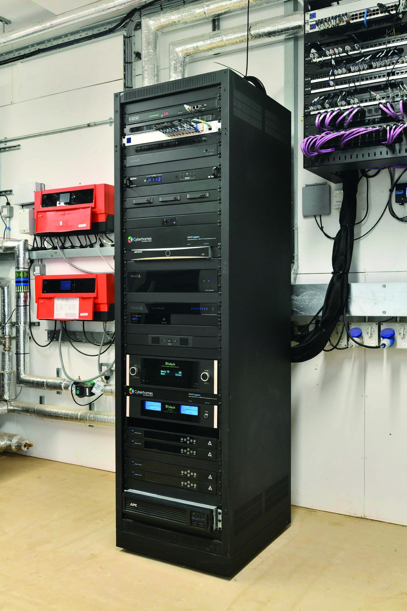 AV rack in the basement keeps equipment out of the living spaces