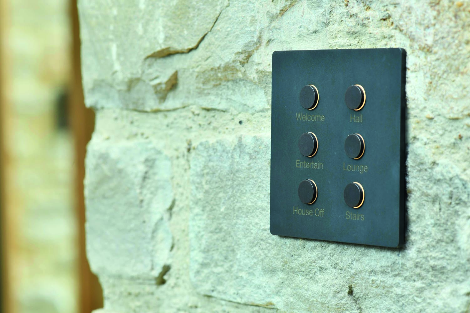 Bespoke-engraved Lutron Allise wallplates allow easy selection of lighting scenes