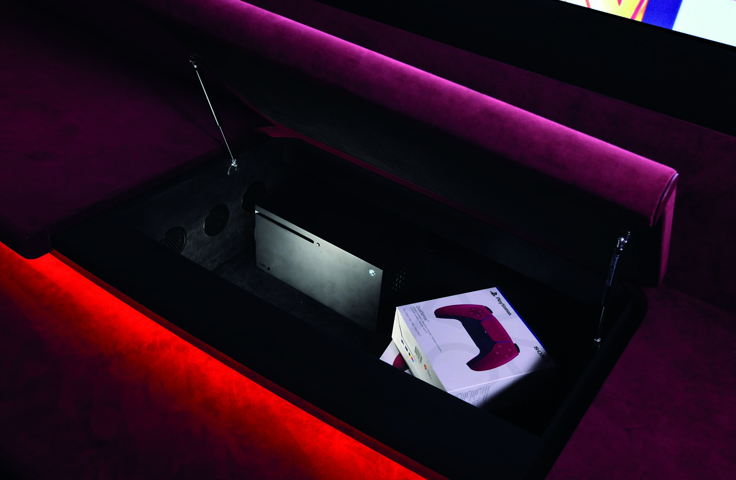 Gaming consoles were integrated into the front of the room